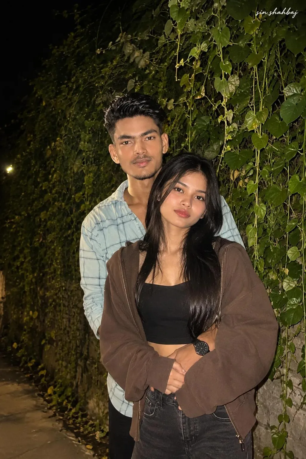 A realistic nighttime couple photo