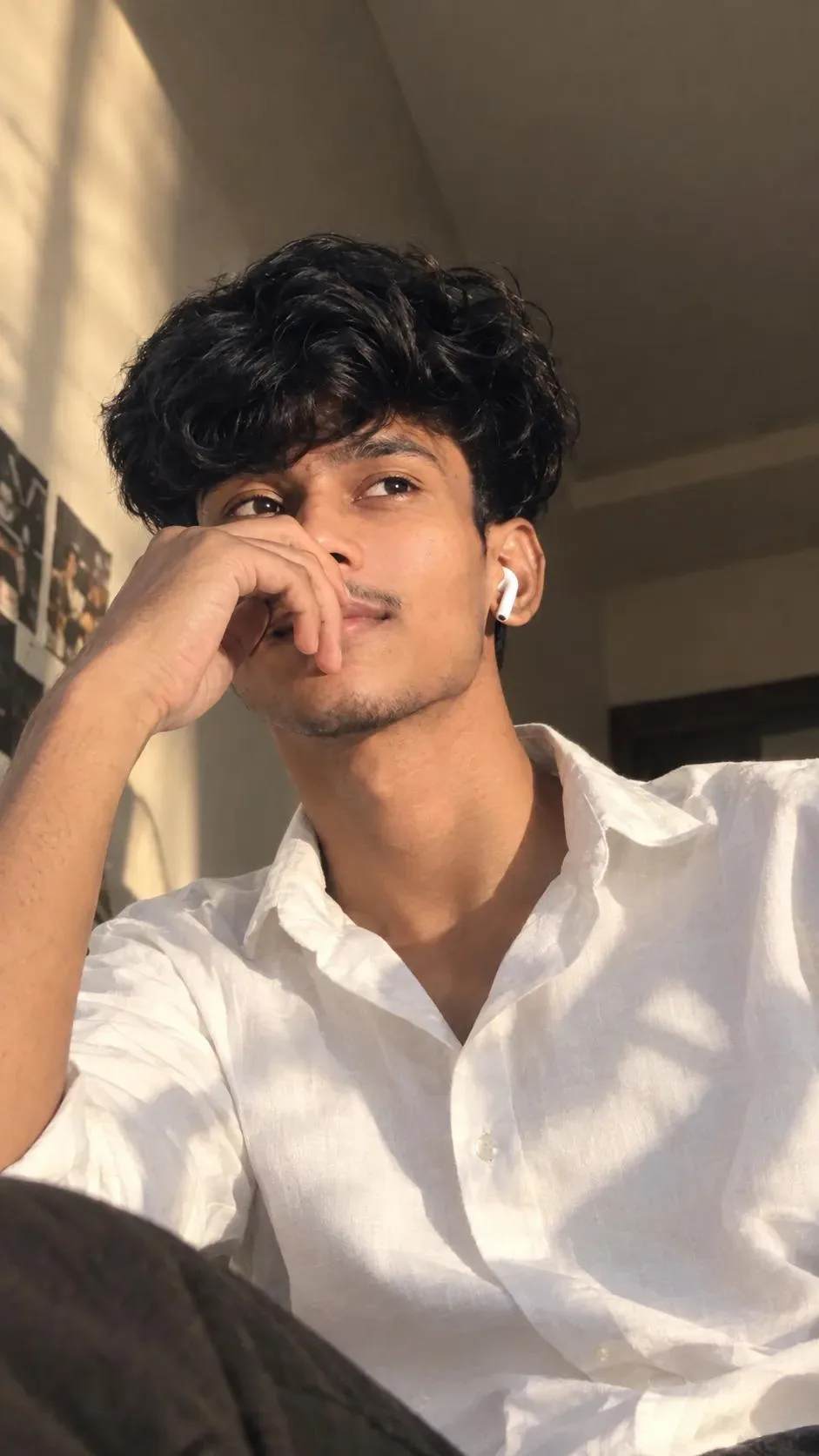 Aesthetic portrait of a young man in soft natural sunlight