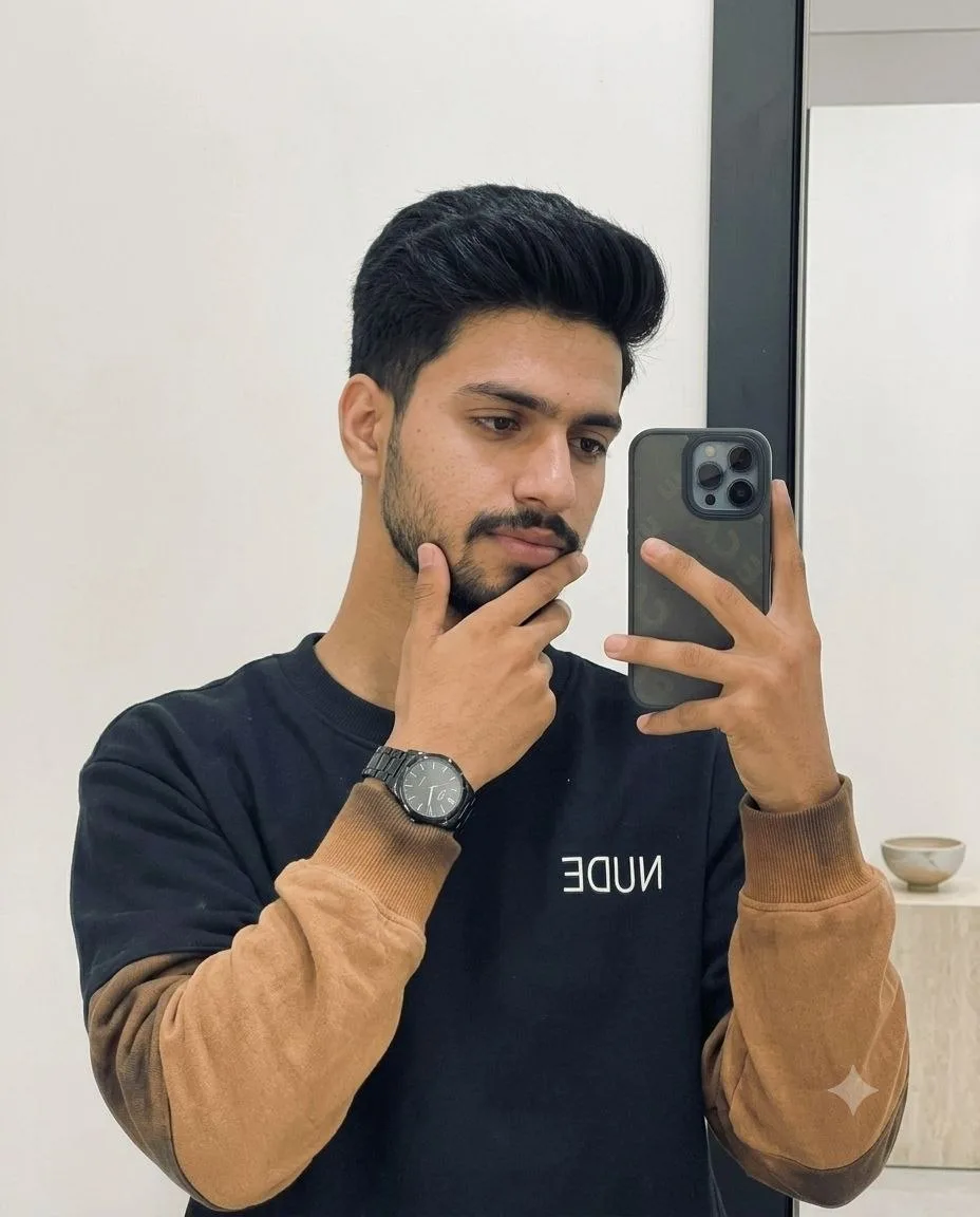 Transform the uploaded portrait into an ultra-realistic indoor mirror selfie while