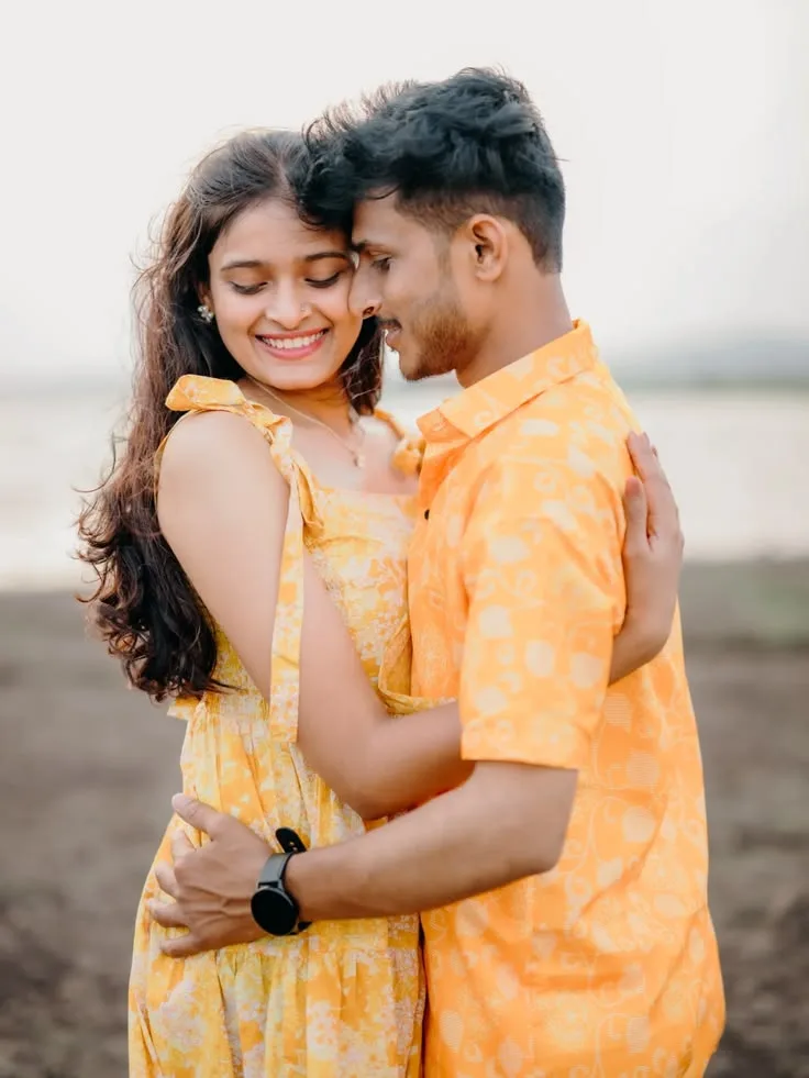 Candid Outdoor Pre-Wedding Portrait of Young Indian Couple by Lakeshore