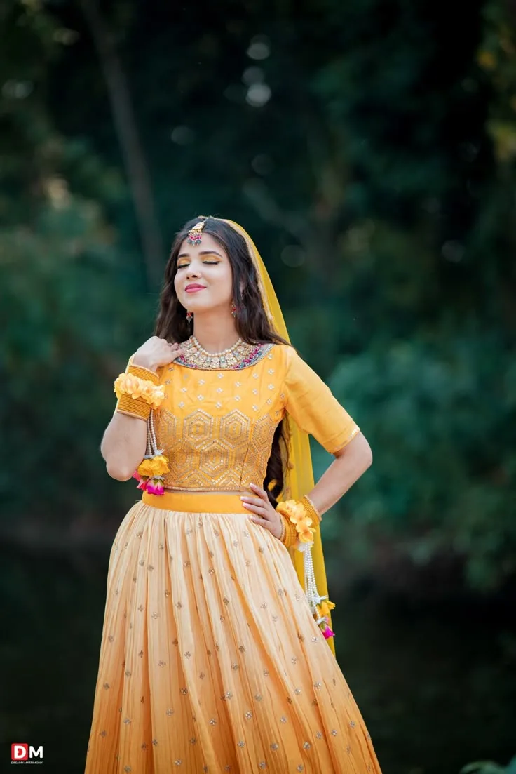 Candid Haldi Ceremony Portrait of Indian Bride in Yellow Lehenga