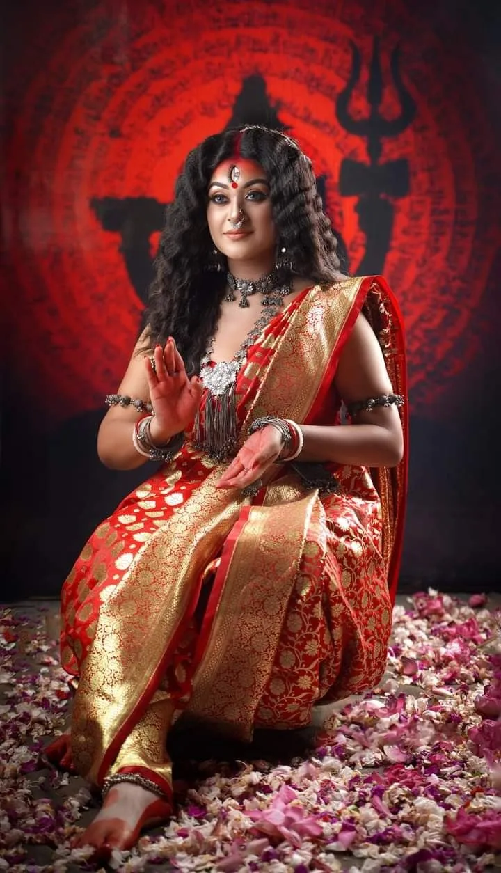 Devotional Navratri Portrait of Young Woman Embodying Goddess Durga on Petal-Strewn Ground