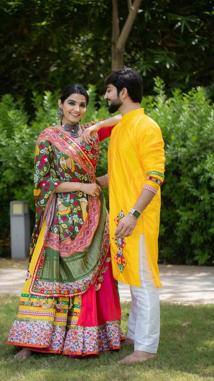 Festive Navratri Garba Portrait of Young Couple in Colorful Chaniya Choli and Yellow Kurta