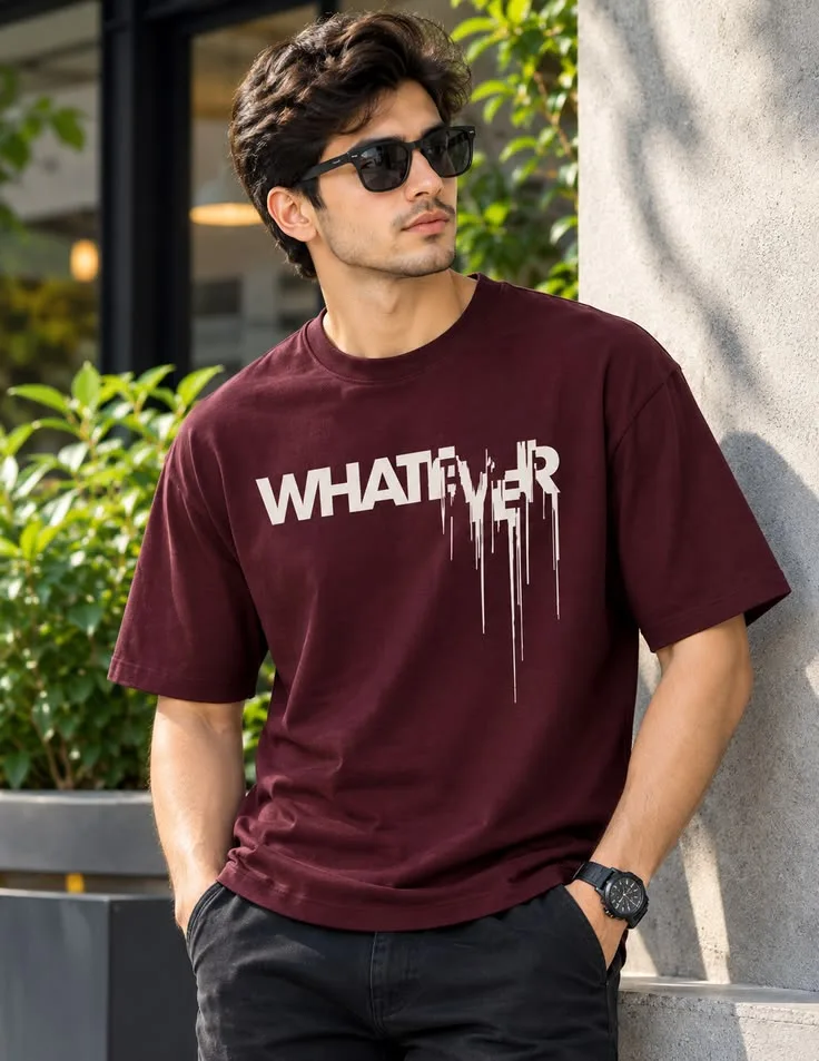 Candid Urban Streetwear Portrait of Young Man in Maroon Graphic T-Shirt and Sunglasses