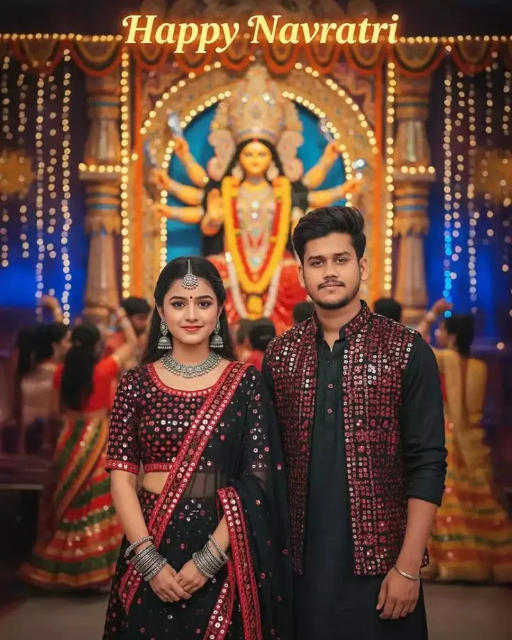 Festive Navratri Portrait of Young Couple in Embellished Black Attire Before Maa Durga Idol
