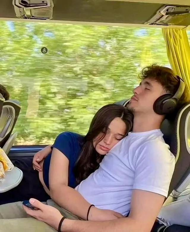 π€ Peaceful Journey β Couple Sleeping Together on a Bus