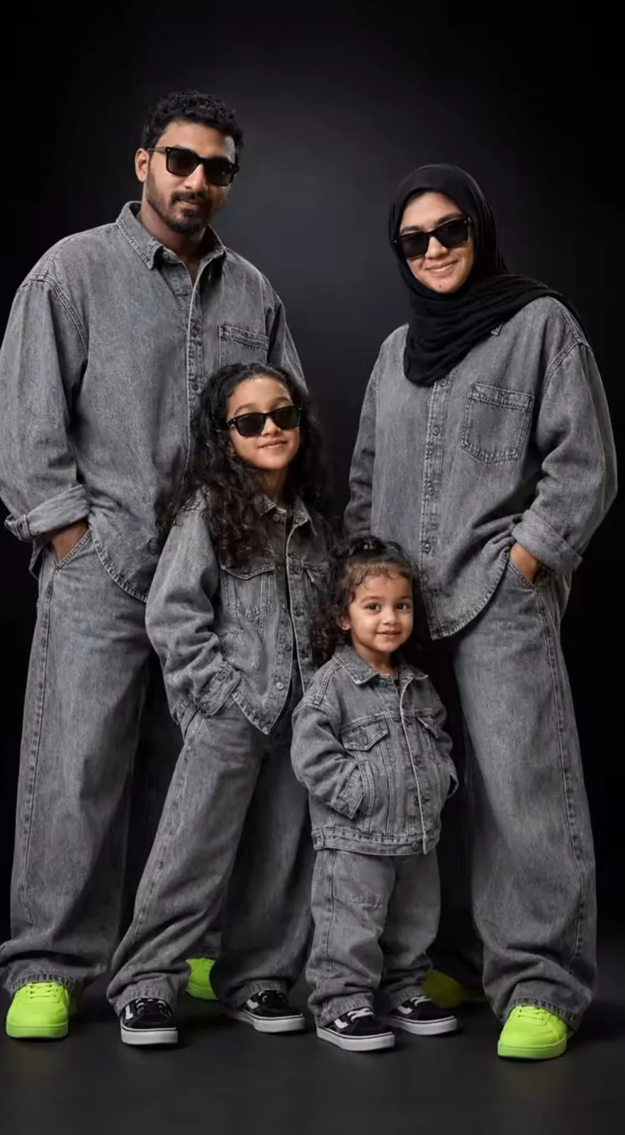 Professional family fashion portrait A photorealistic full-body studio portrait of a