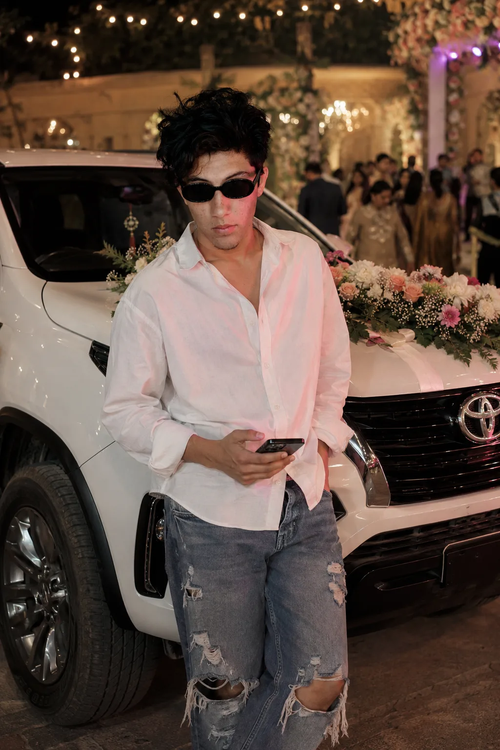 Create Effortlessly stylish mid-shot of a very handsome young boy with