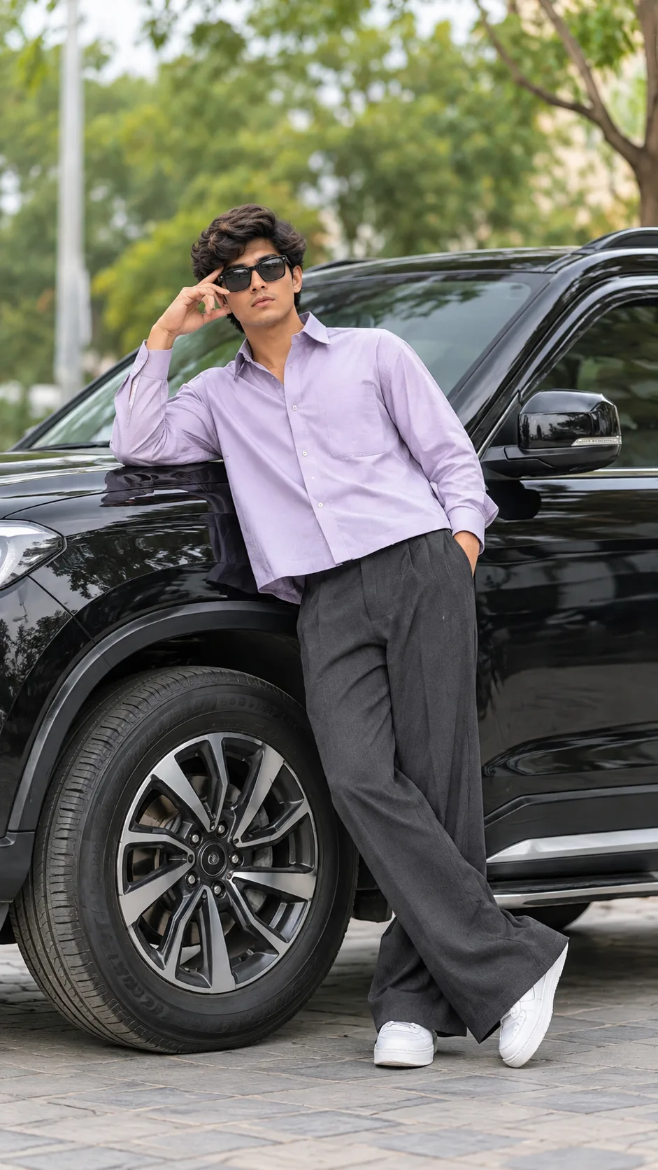 Casual Streetwear Portrait of Young Man Leaning Against Black SUV